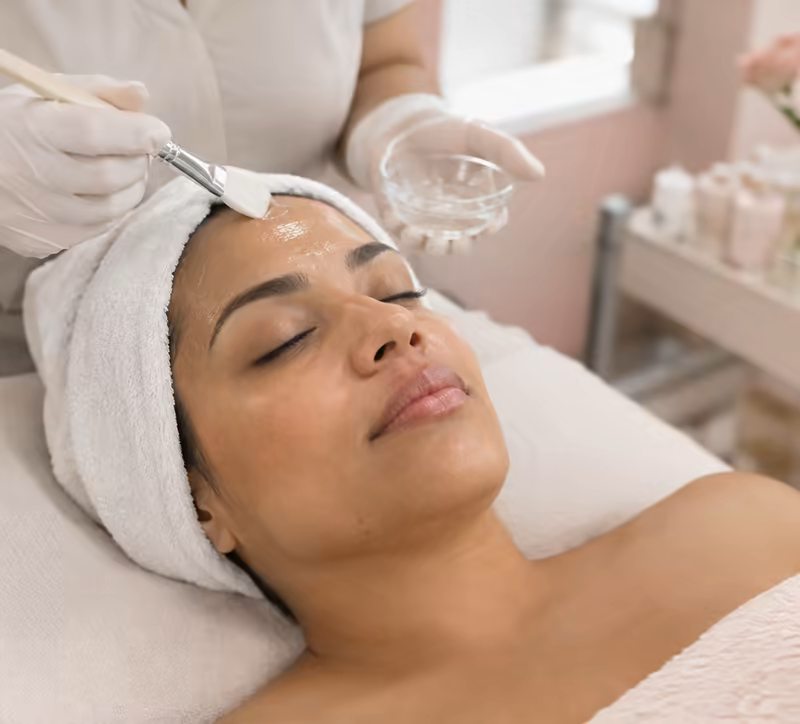 A client relaxing during a facial.