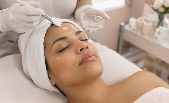 A client relaxing during a facial.